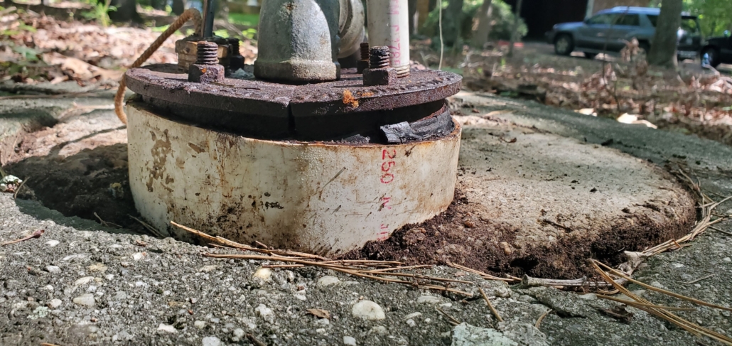 Corroded, improperly sealed well head found during a well inspection